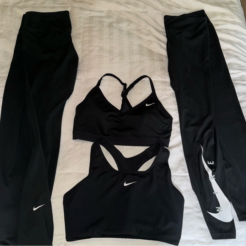Nike - Two pair of leggings (L) two sports bras (L) Black